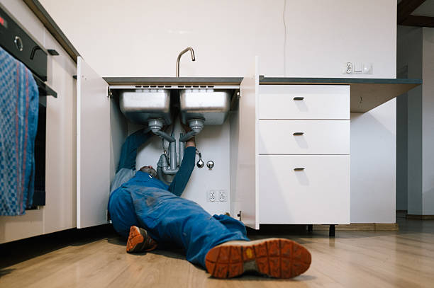 Professional Drain Cleaning technician working in Columbia City, OR